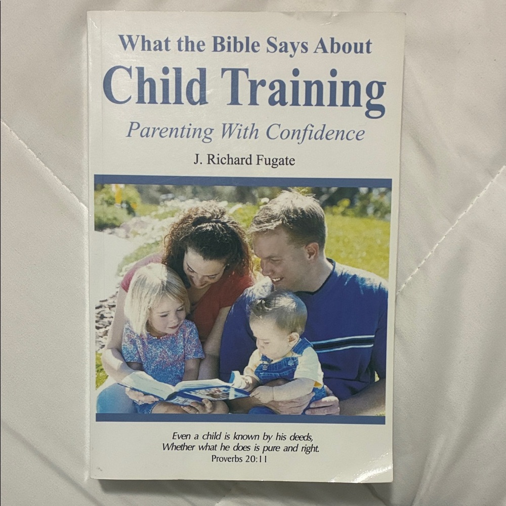 Source Unknown Family Guidebook with Blue and White Cover